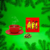 christmas flovour tea with red and yellow illustration packaging